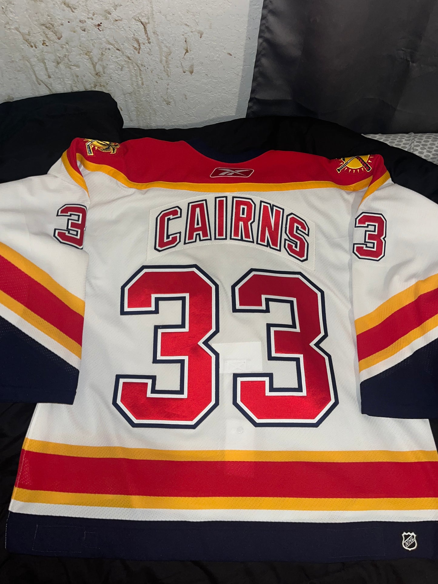 Panthers Eric Cairns Game Issued Reebok 2005-2006 White 58 (used), Meigrey and Panthers COA