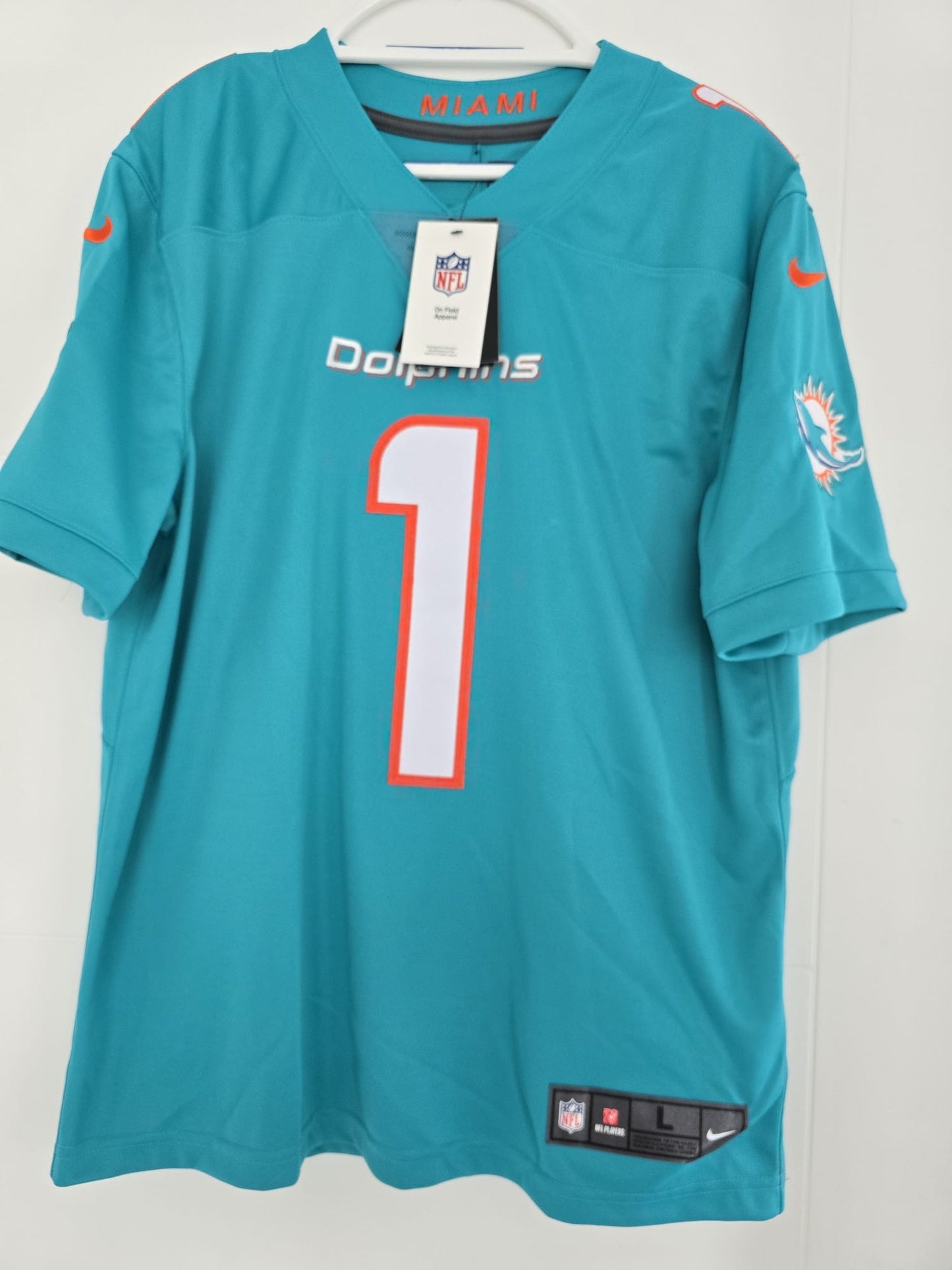 Dolphins Tua Tagovailoa Autographed Nike Limited Aqua 44 (NWT) Fanatics COA